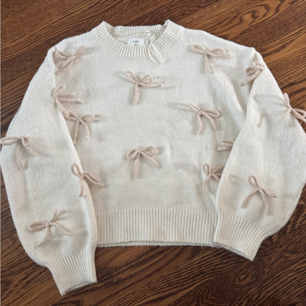 Women’s size small bow sweater